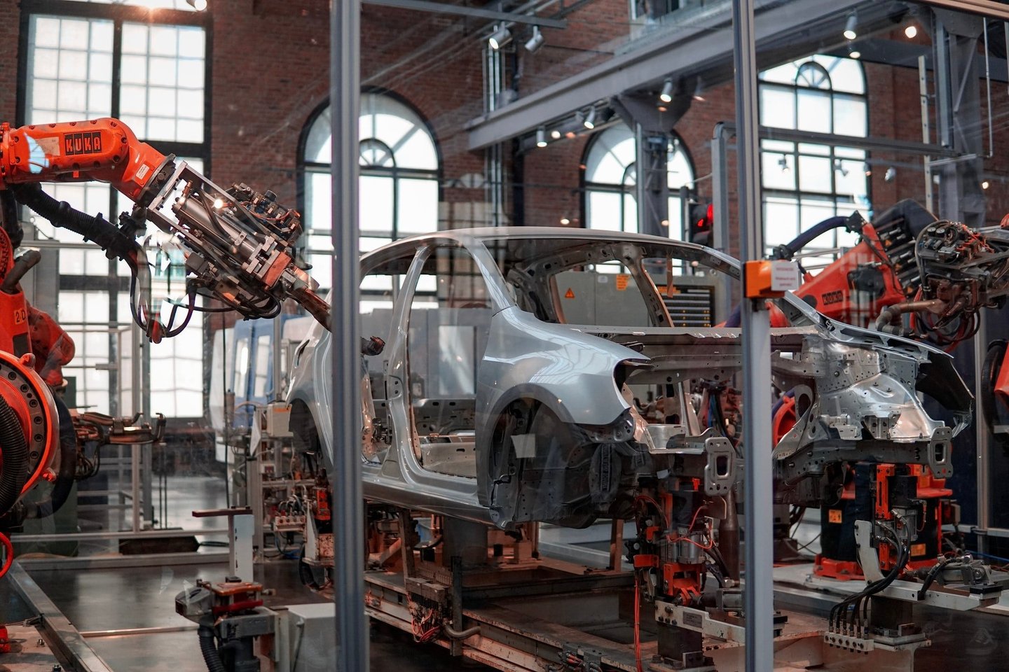 A car manufacturing robot in an industrial environment